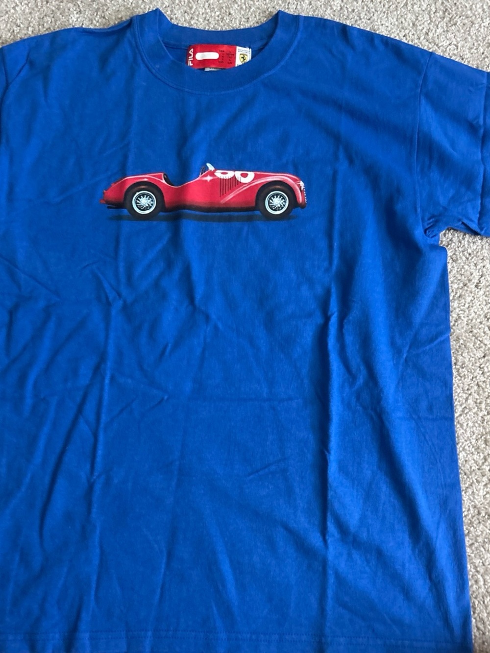 Ferrari Blue Tee with Red Neck Label and Yellow Shield Patch